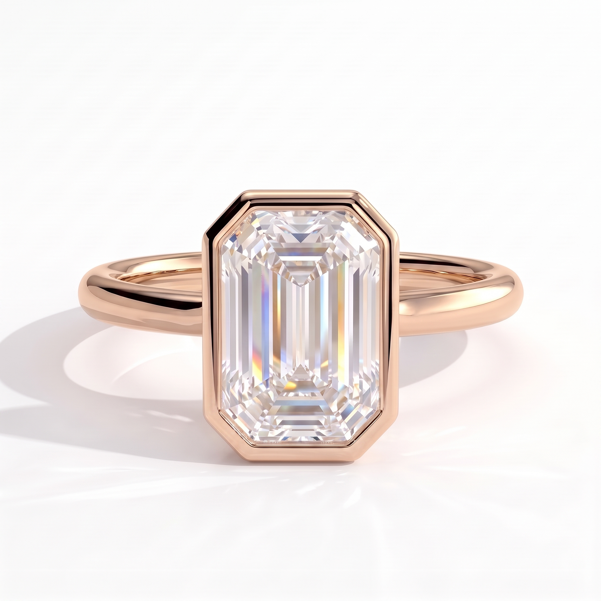 Emerald lab-grown diamond bezel-set solitaire engagement ring in 14K (585) rose gold, front view 