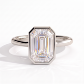 Emerald lab-grown diamond bezel-set solitaire engagement ring in 950 platinum, front view 
