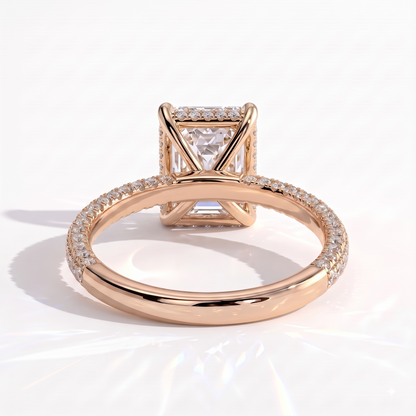Radiant lab-grown diamond halo engagement ring in 14K (585) rose gold, on white background 