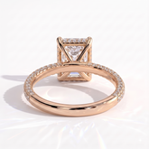 Radiant lab-grown diamond halo engagement ring in 18K (750) rose gold, on white background 