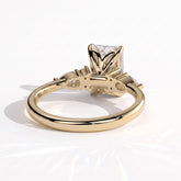 Radiant lab-grown diamond halo engagement ring in 14K (585) yellow gold, on white background 