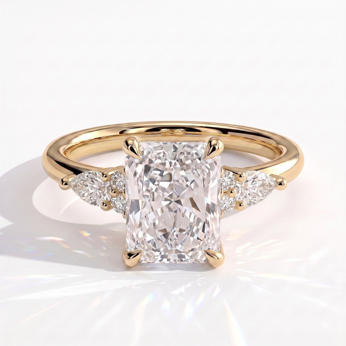 Radiant lab-grown diamond halo engagement ring in 18K (750) yellow gold, front view 