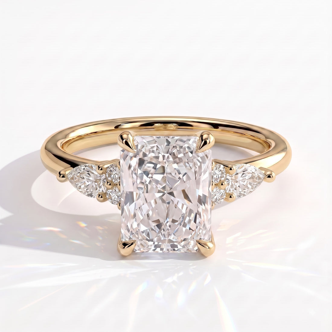 Radiant lab-grown diamond halo engagement ring in 14K (585) yellow gold, front view 