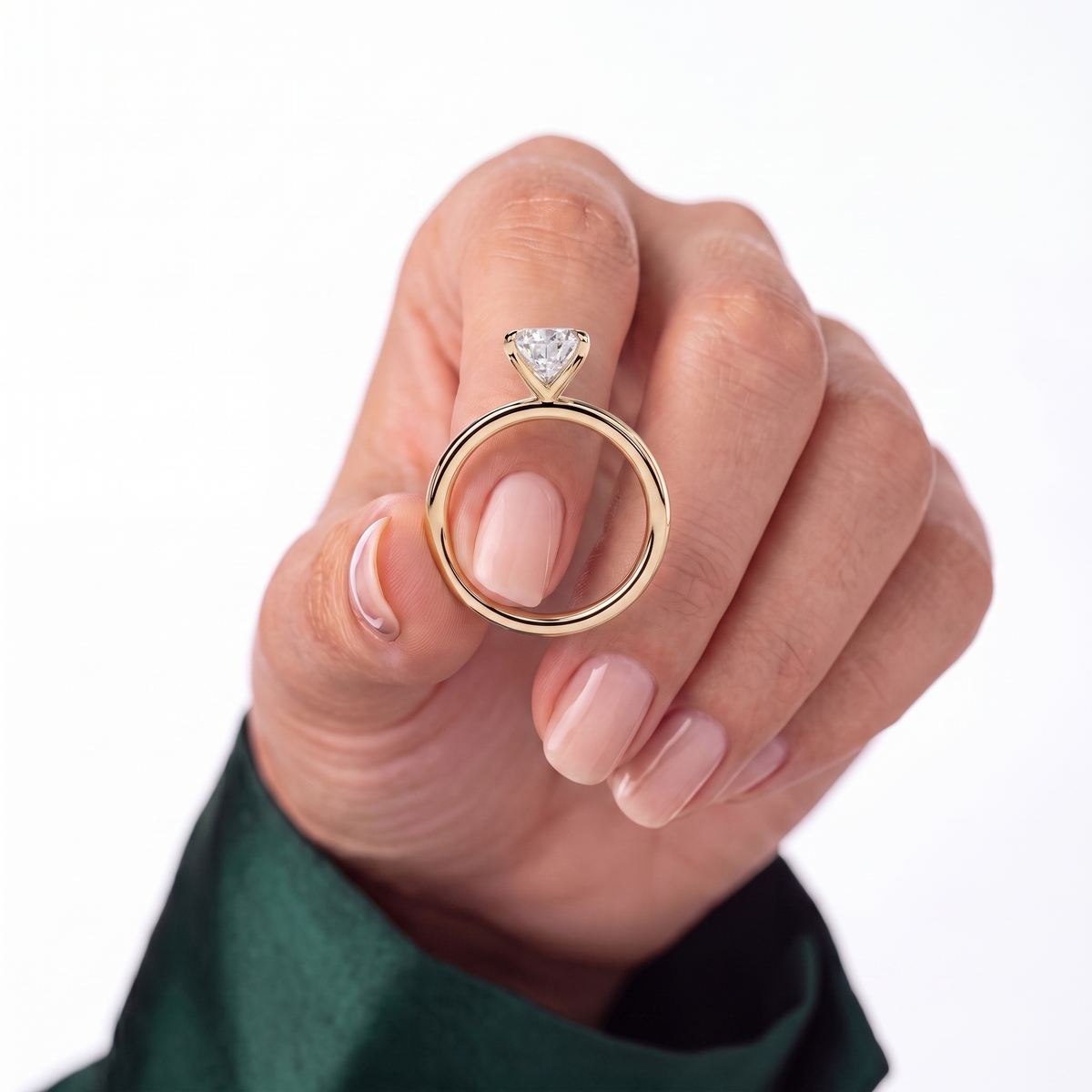 Pear lab-grown diamond solitaire engagement ring in 18K (750) yellow gold, studio view 