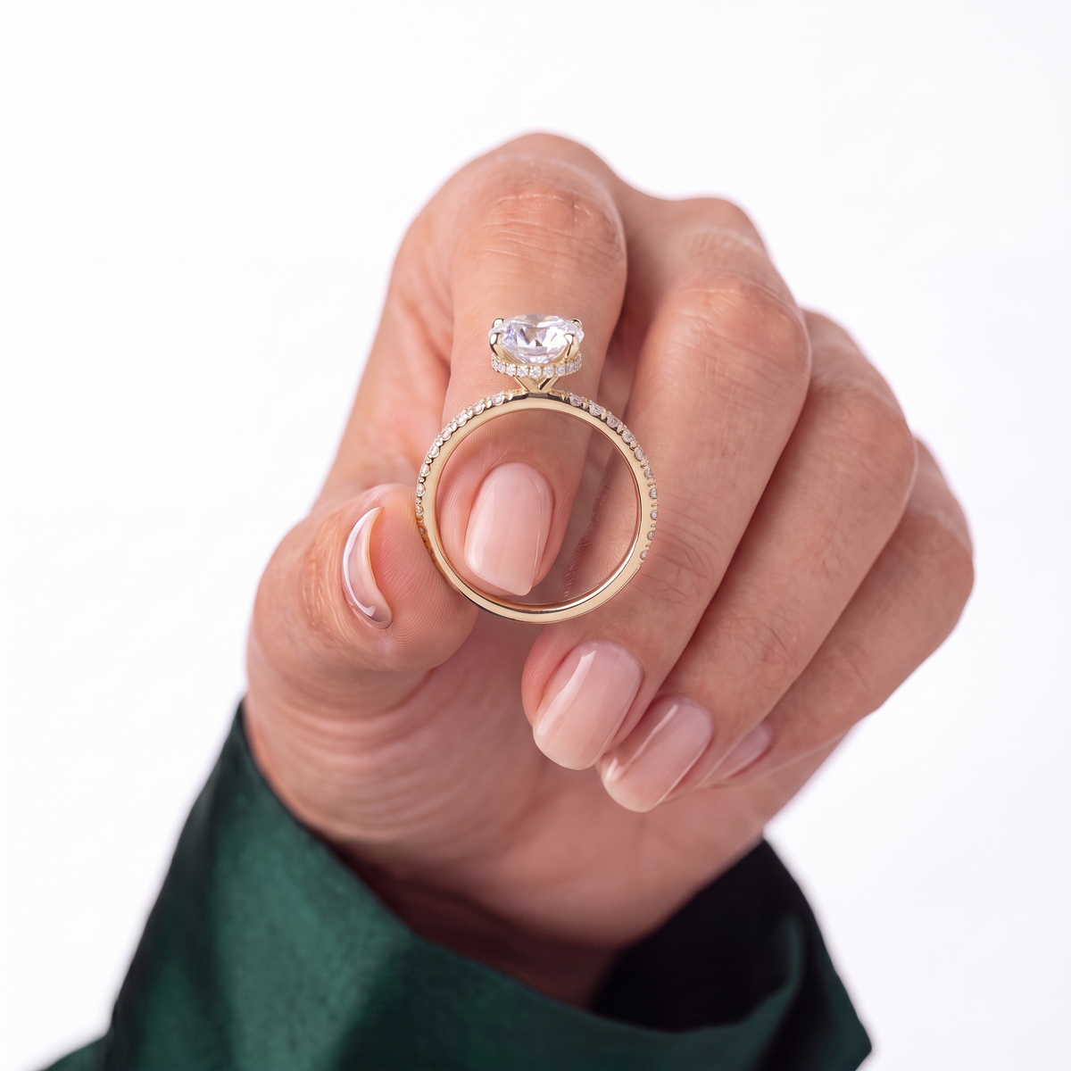 Pear lab-grown diamond halo engagement ring in 14K (585) yellow gold, studio view 