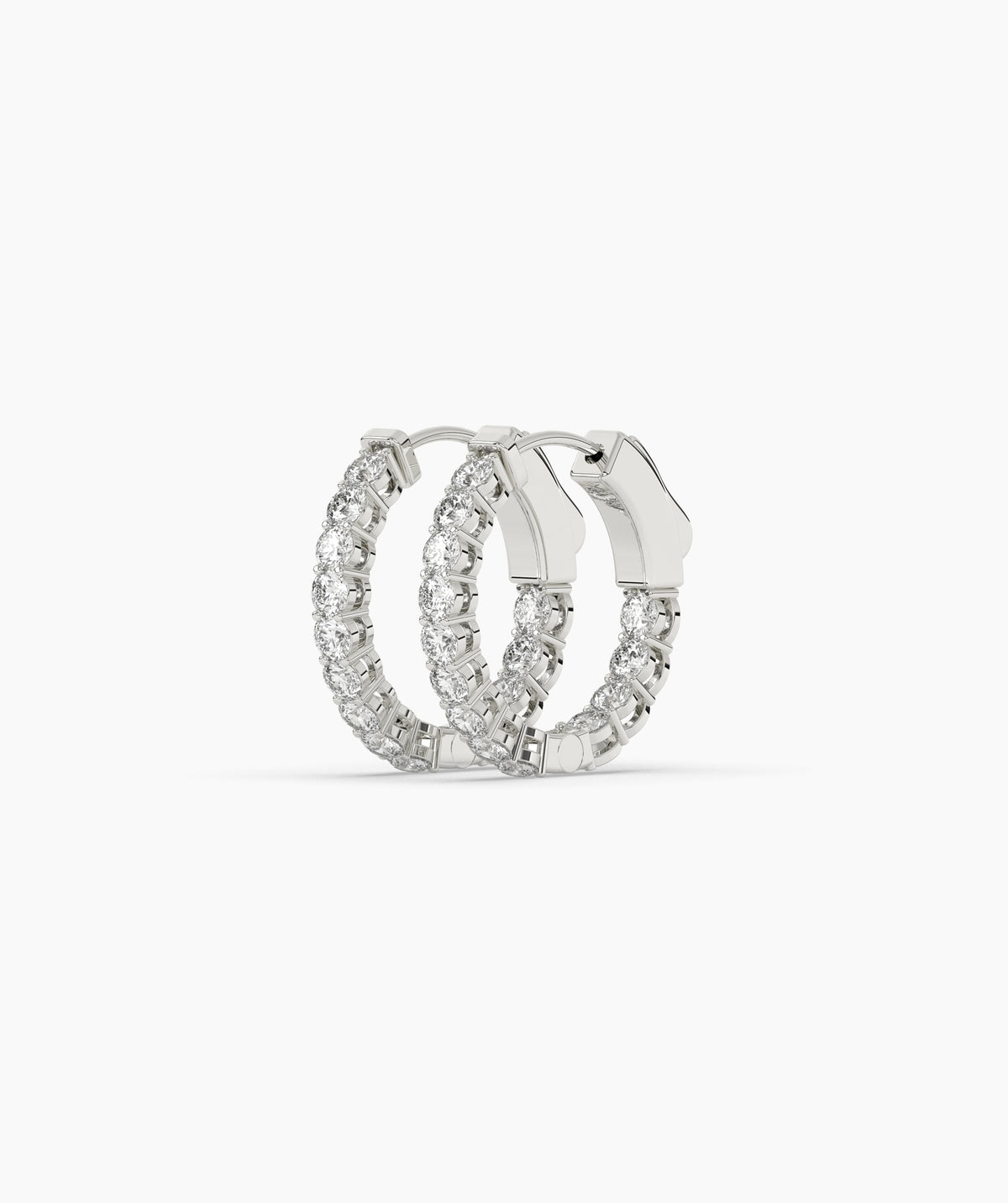 white gold hoop earring on a white background. 