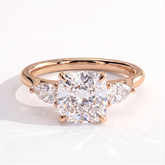 Cushion lab-grown diamond three-stone engagement ring in 18K (750) rose gold, front view 