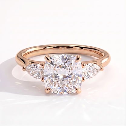 Cushion lab-grown diamond three-stone engagement ring in 18K (750) rose gold, front view 