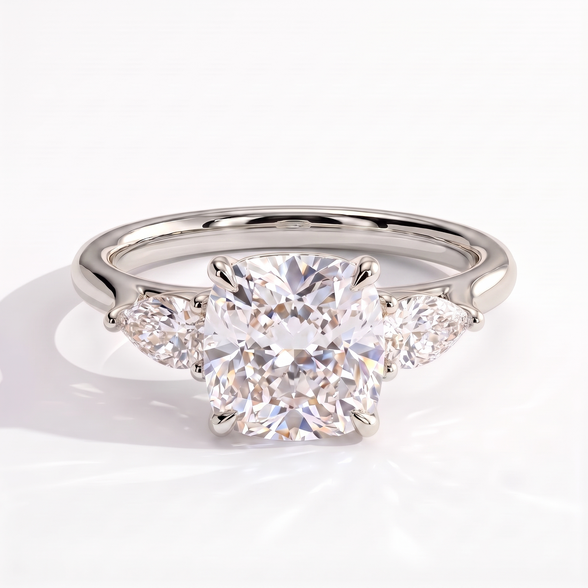 Cushion lab-grown diamond three-stone engagement ring in 14K (585) white gold, front view 