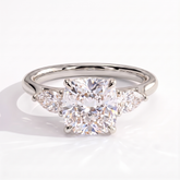 Cushion lab-grown diamond three-stone engagement ring in 950 platinum, front view 