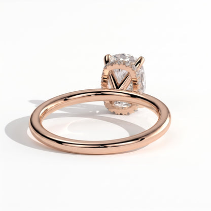 Elongated Cushion lab-grown diamond solitaire engagement ring in 18K (750) rose gold, on white background 