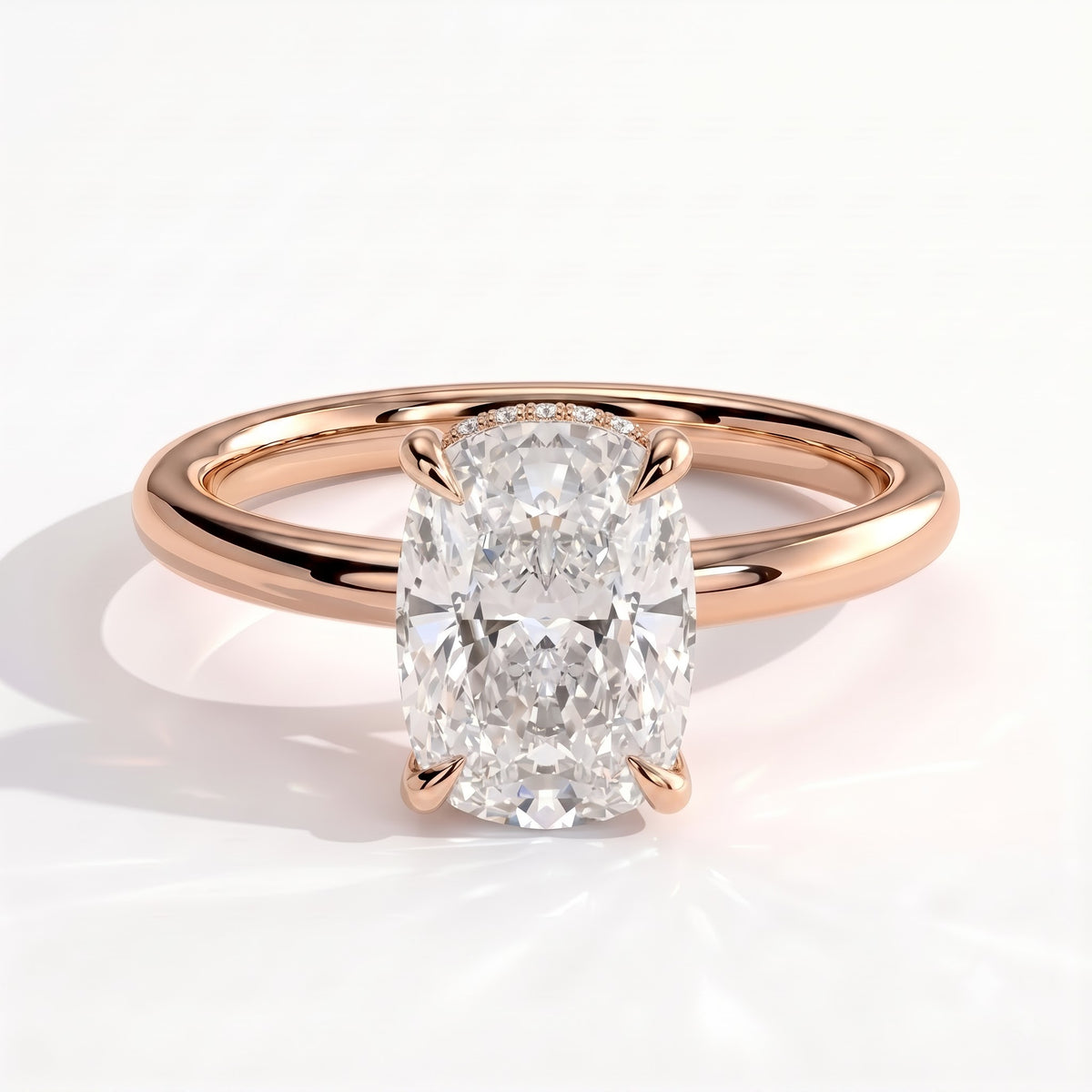 Elongated Cushion lab-grown diamond solitaire engagement ring in 18K (750) rose gold, front view 