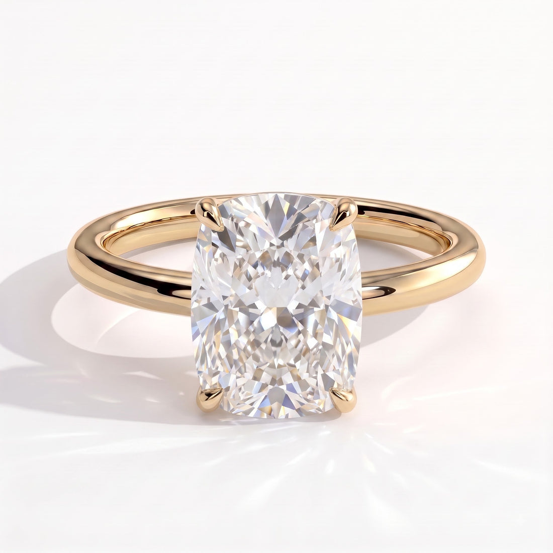 Elongated Cushion lab-grown diamond solitaire engagement ring in 14K (585) yellow gold, front view 