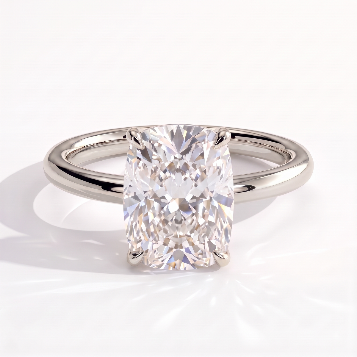 Elongated Cushion lab-grown diamond solitaire engagement ring in 950 platinum, front view 