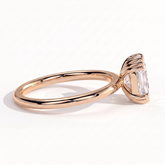 Elongated Cushion lab-grown diamond solitaire engagement ring in 14K (585) rose gold, on white background 