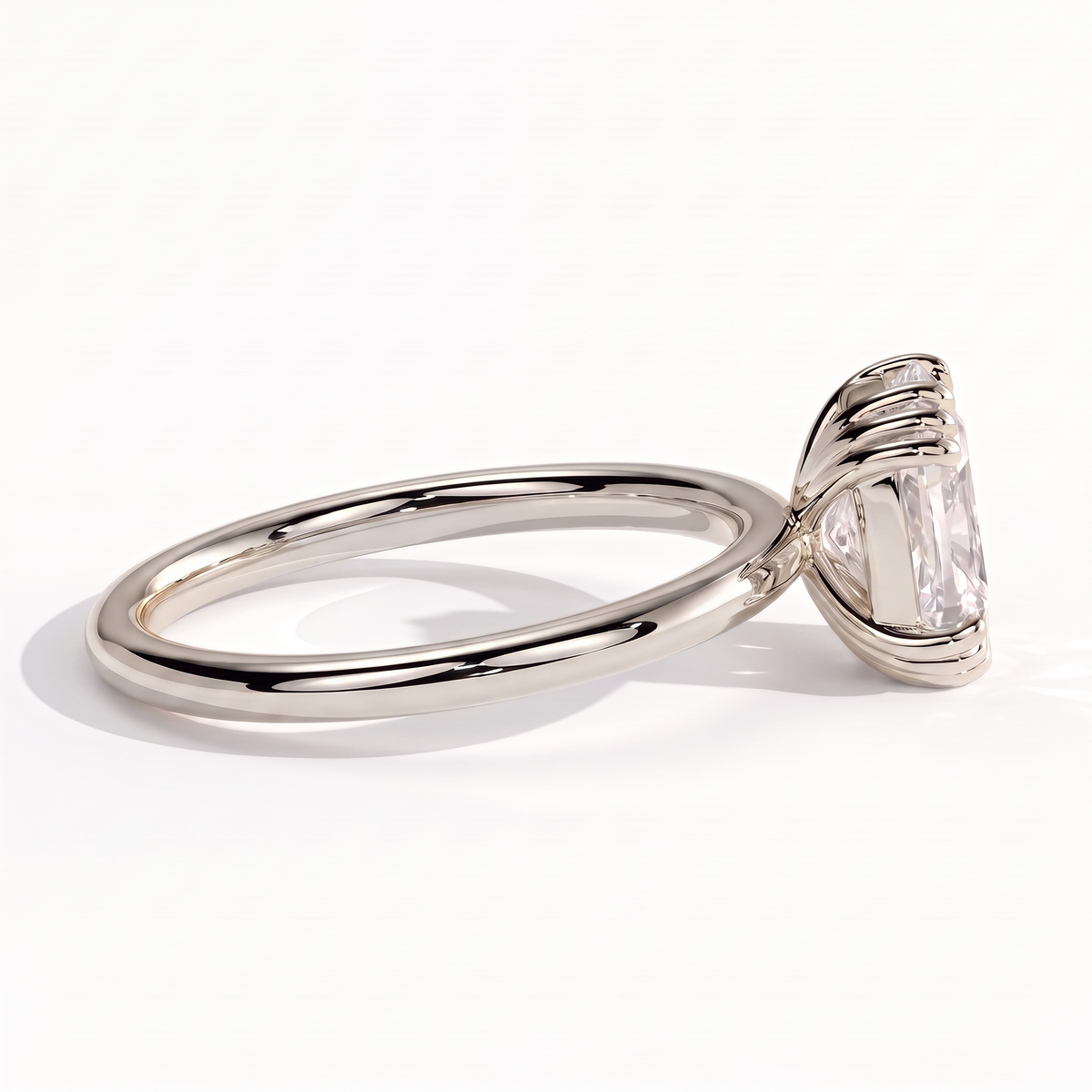 Elongated Cushion lab-grown diamond solitaire engagement ring in 14K (585) white gold, on white background 