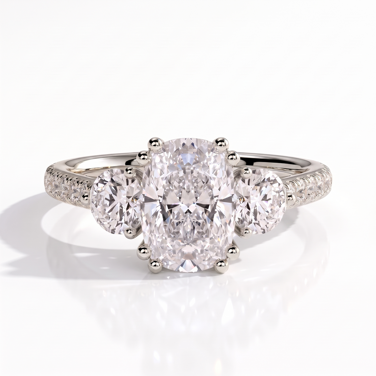 Elongated Cushion lab-grown diamond three-stone engagement ring in 14K (585) white gold, front view 