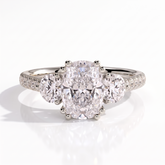 Elongated Cushion lab-grown diamond three-stone engagement ring in 18K (750) white gold, front view 