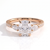 Elongated Cushion lab-grown diamond three-stone engagement ring in 18K (750) rose gold, front view 