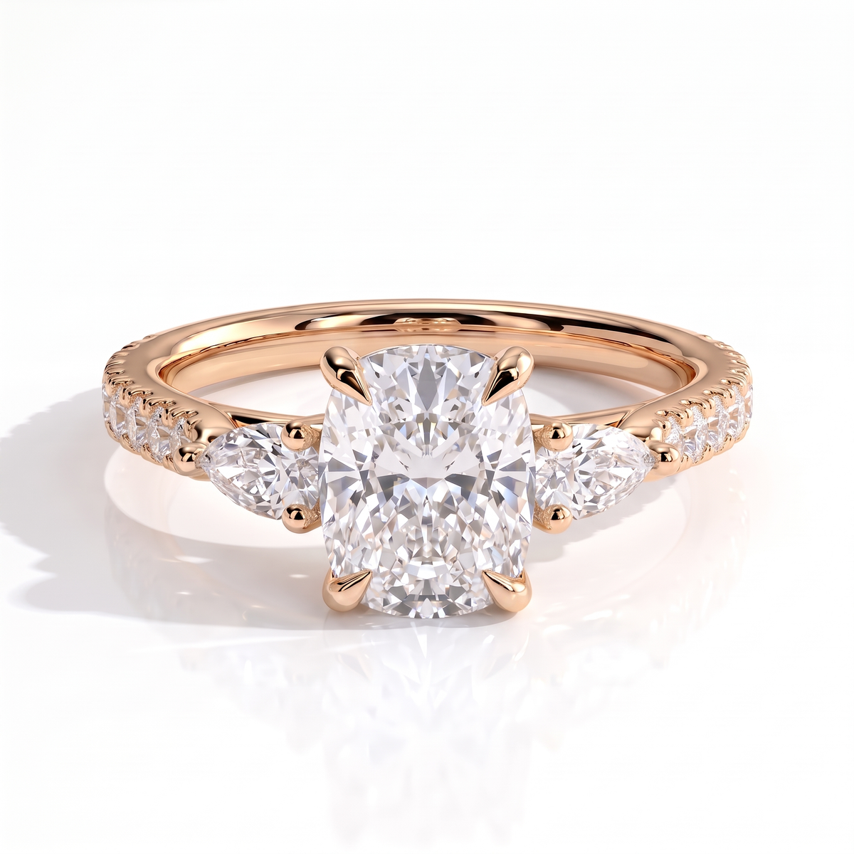Elongated Cushion lab-grown diamond three-stone engagement ring in 18K (750) rose gold, front view 