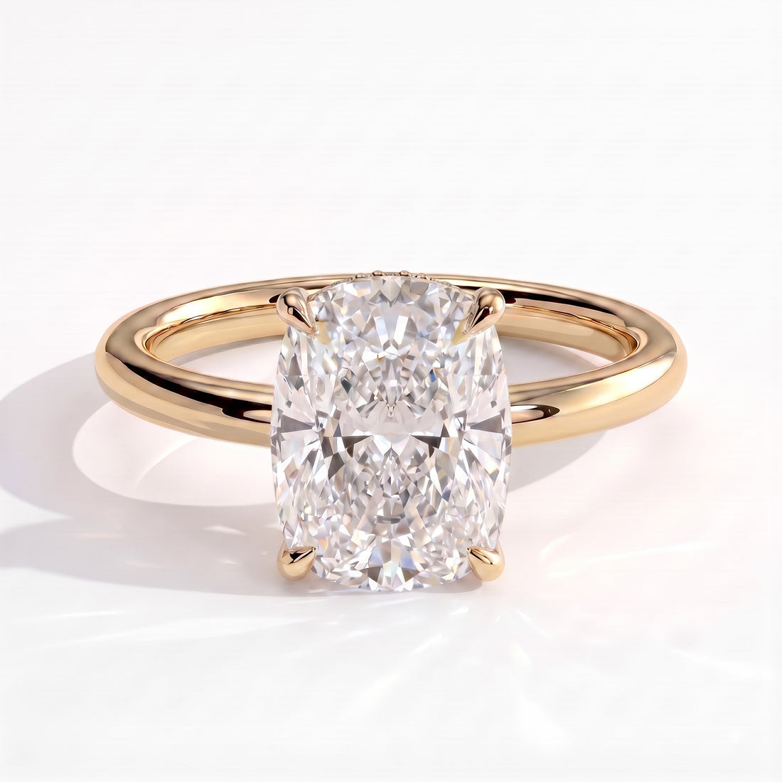 Elongated Cushion lab-grown diamond halo engagement ring in 14K (585) yellow gold, front view 