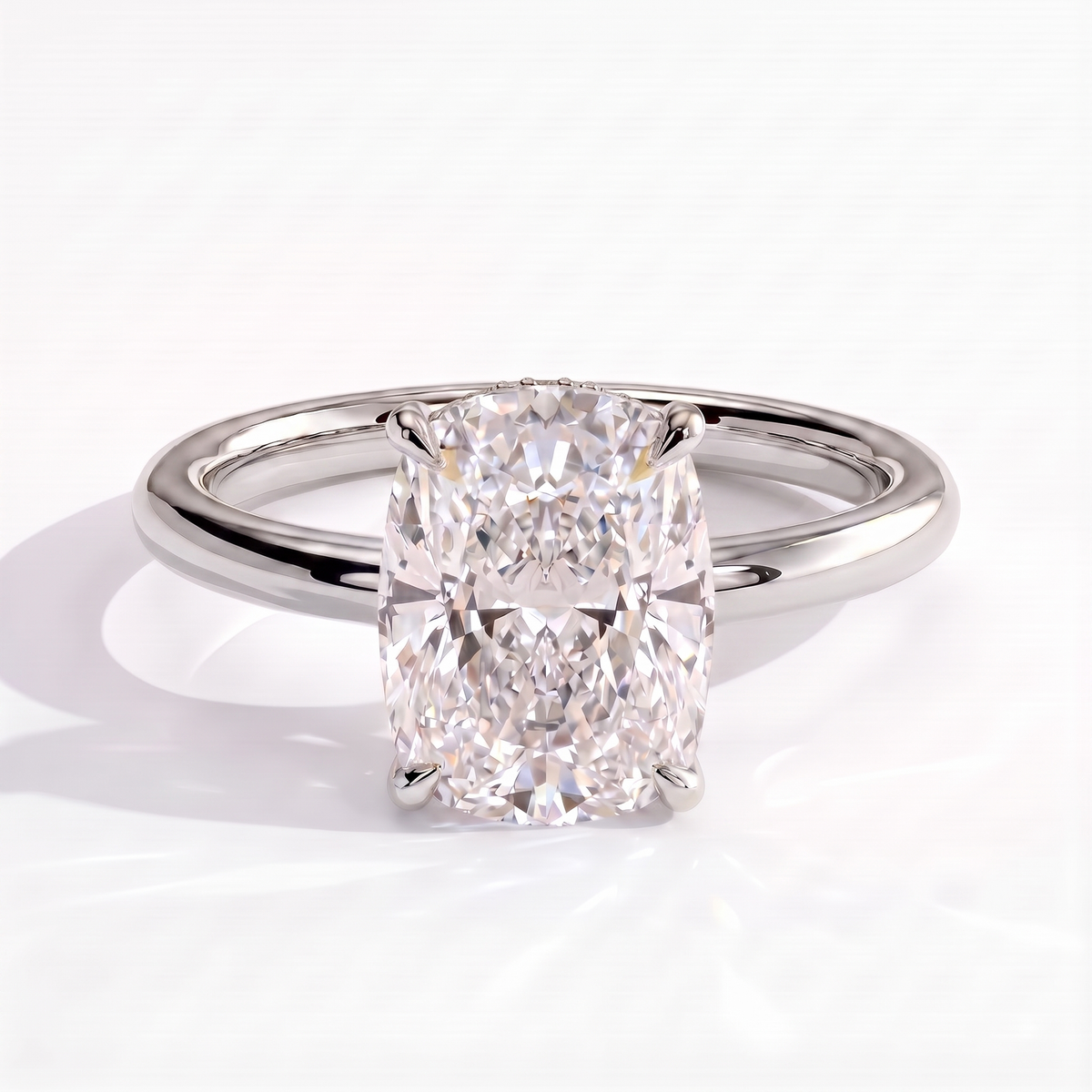 Elongated Cushion lab-grown diamond halo engagement ring in 18K (750) white gold, front view 