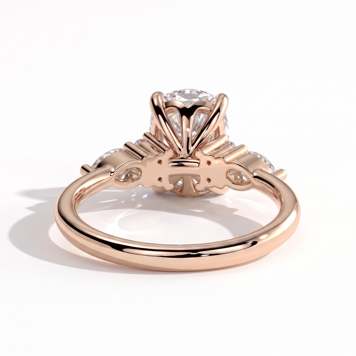 Elongated Cushion lab-grown diamond halo engagement ring in 14K (585) rose gold, on white background 