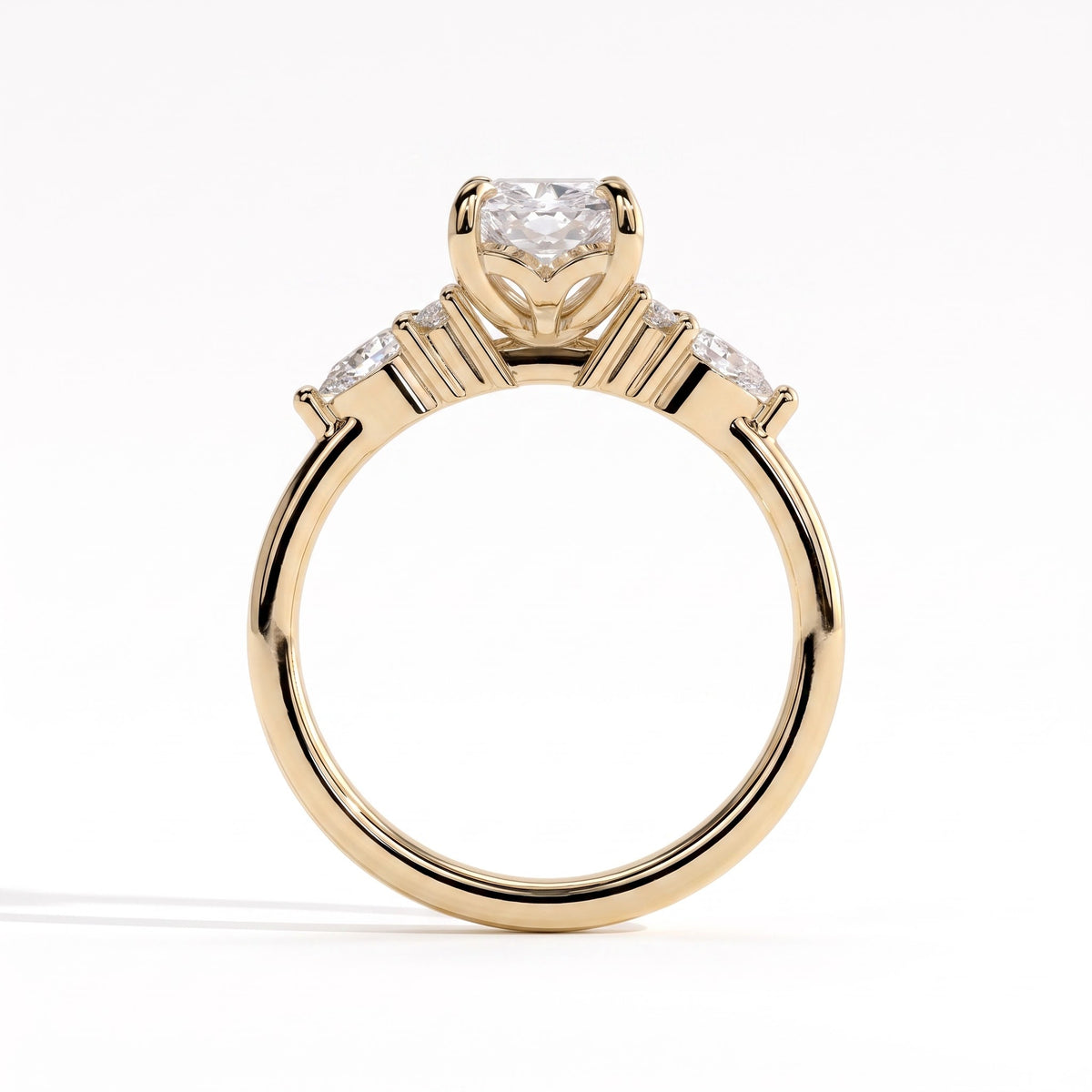 Elongated Cushion lab-grown diamond halo engagement ring in 14K (585) yellow gold, side profile 