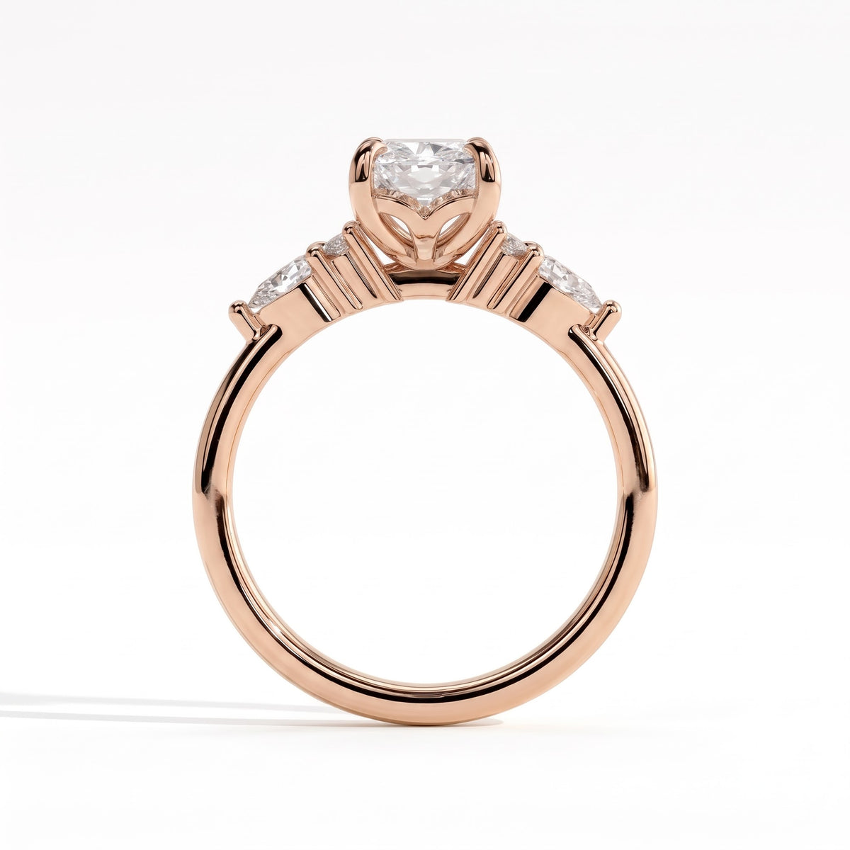Elongated Cushion lab-grown diamond halo engagement ring in 14K (585) rose gold, side profile 