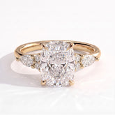 Elongated Cushion lab-grown diamond halo engagement ring in 18K (750) yellow gold, front view 