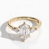 Elongated Hexagon lab-grown diamond three-stone engagement ring in 18K (750) yellow gold, front view 