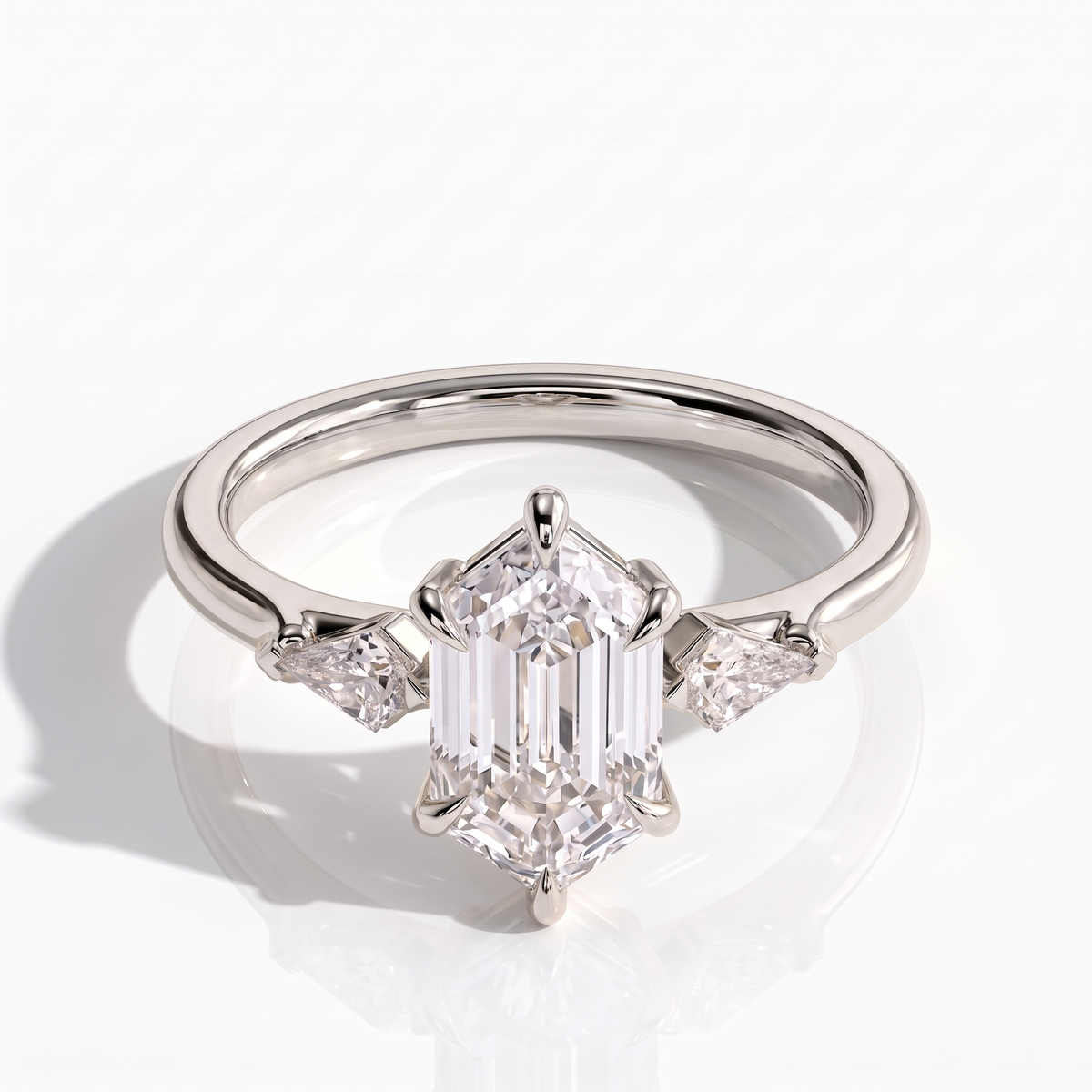 Elongated Hexagon lab-grown diamond three-stone engagement ring in 950 platinum, front view 