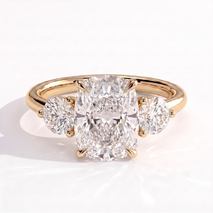 Elongated Cushion lab-grown diamond three-stone engagement ring in 14K (585) yellow gold, front view 