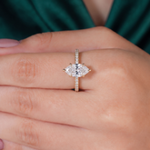Marquise lab-grown diamond halo engagement ring in 18K (750) rose gold, three-quarter view 