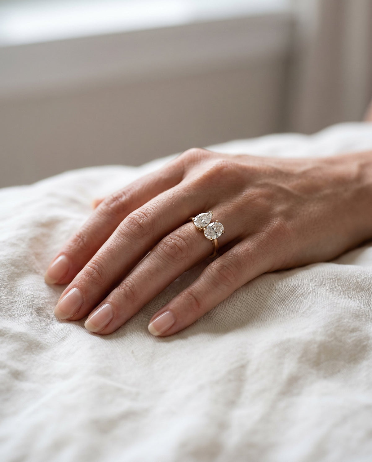 Toi et moi engagement ring with pear and oval diamonds | BEUSÉA