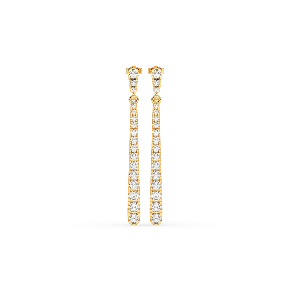 Gold earrings with clear stones on a white background. 