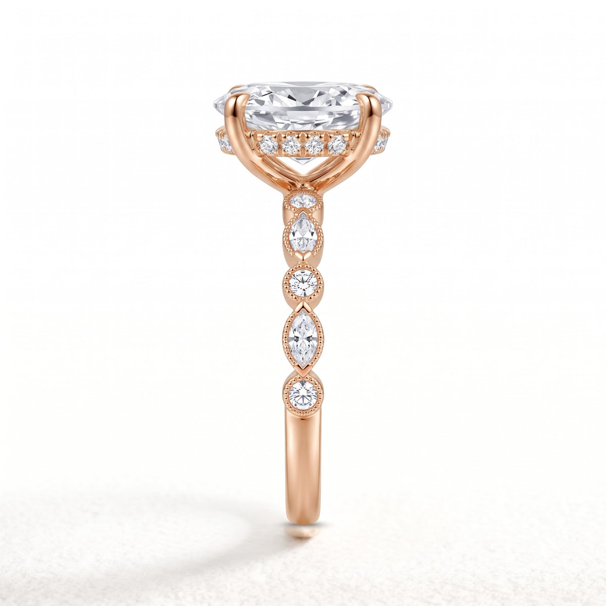 Oval lab-grown diamond hidden halo engagement ring with vintage milgrain accent band in 18K (750) rose gold, side view 