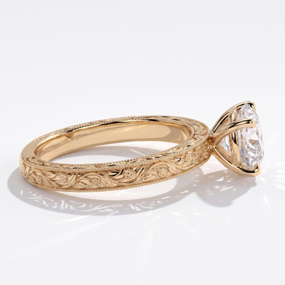 Round lab-grown diamond vintage engraved solitaire engagement ring in 14K (585) yellow gold, close-up of the hand-engraved band 