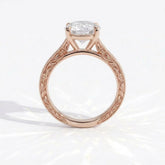 Round lab-grown diamond vintage engraved solitaire engagement ring in 14K (585) rose gold, profile view showing the gallery 