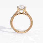 Round lab-grown diamond vintage engraved solitaire engagement ring in 14K (585) yellow gold, profile view showing the gallery 