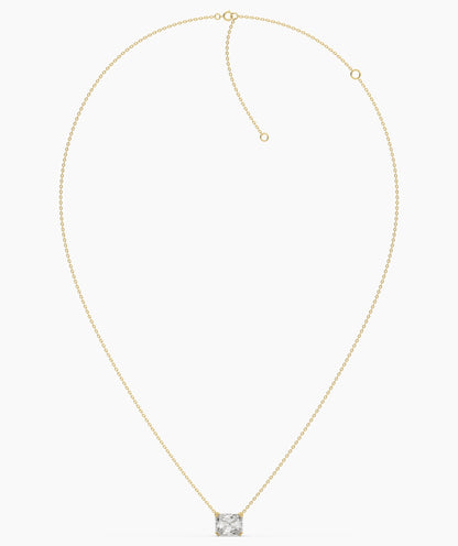 Celeste east-west radiant cut lab-grown diamond solitaire pendant necklace in 14K (585) yellow gold, chain laid out with clasp 