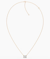 Celeste east-west radiant cut lab-grown diamond solitaire pendant necklace in 14K (585) rose gold, chain laid out with clasp 
