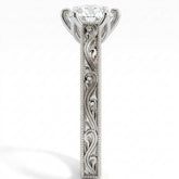 Round lab-grown diamond vintage filigree solitaire engagement ring in 18K (750) white gold, close-up of the filigree band 