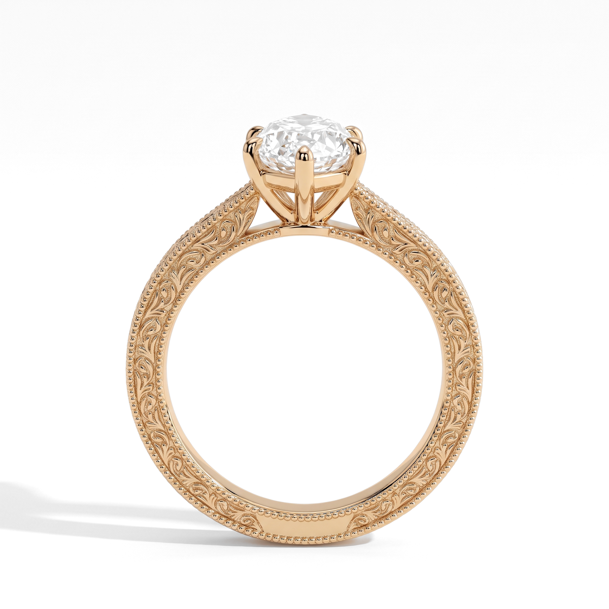 Marquise lab-grown diamond vintage engraved solitaire engagement ring in 18K (750) yellow gold, profile view showing the gallery 