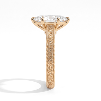 Marquise lab-grown diamond vintage engraved solitaire engagement ring in 14K (585) yellow gold, close-up of the hand-engraved band 