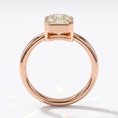 Fancy Intense Yellow emerald cut lab-grown diamond bezel ring in 14K (585) rose gold, front view 