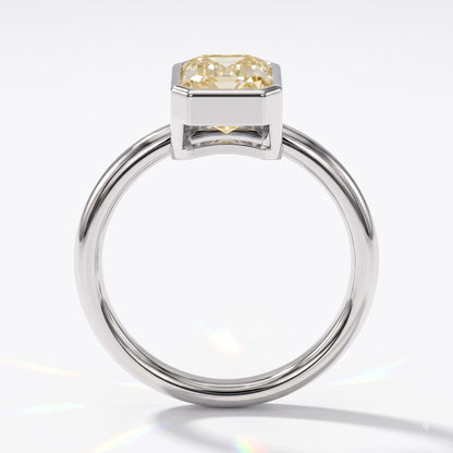 Fancy Intense Yellow emerald cut lab-grown diamond bezel ring in 14K (585) white gold, front view 