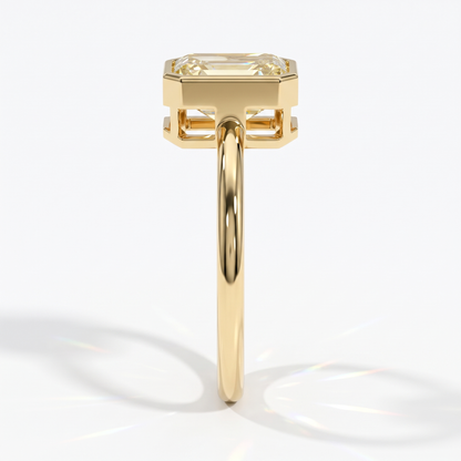 Fancy Intense Yellow emerald cut lab-grown diamond bezel ring in 18K (750) yellow gold, side profile 