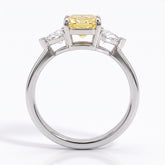 Fancy Vivid Yellow radiant lab-grown diamond three-stone ring with trillion side diamonds in 950 platinum, front view 