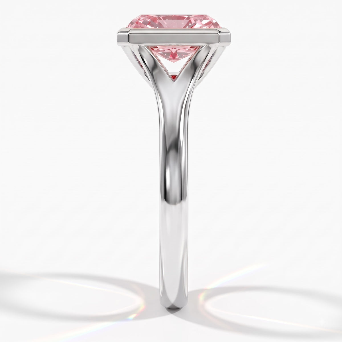 Fancy Vivid Pink radiant lab-grown diamond bezel ring in 950 platinum, side profile 
